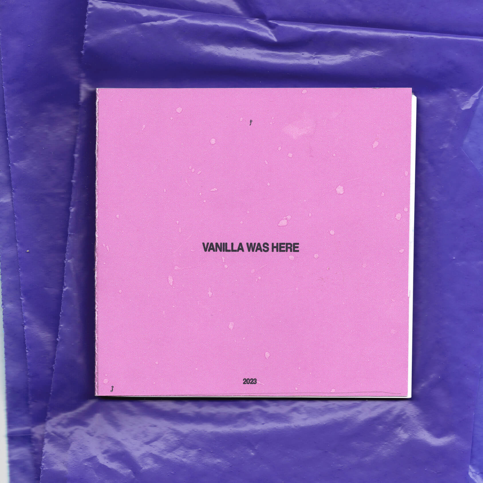 Pink album cover on a purple background.